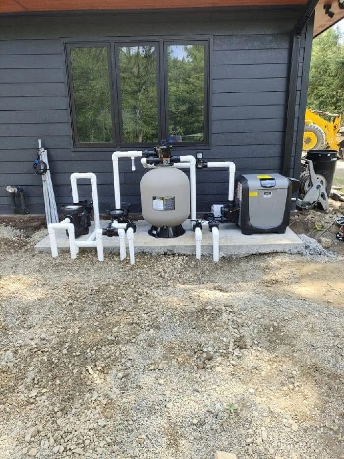 New pool equipment pad with pump, filter and heater